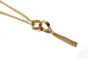 Gold Necklace with Rings and Dangling Chain